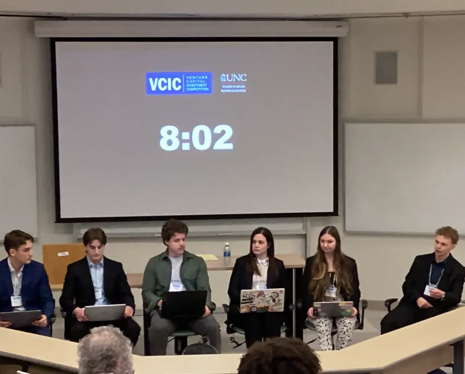 Jack, seated at far right, participating in the Venture Capital Investment Competition